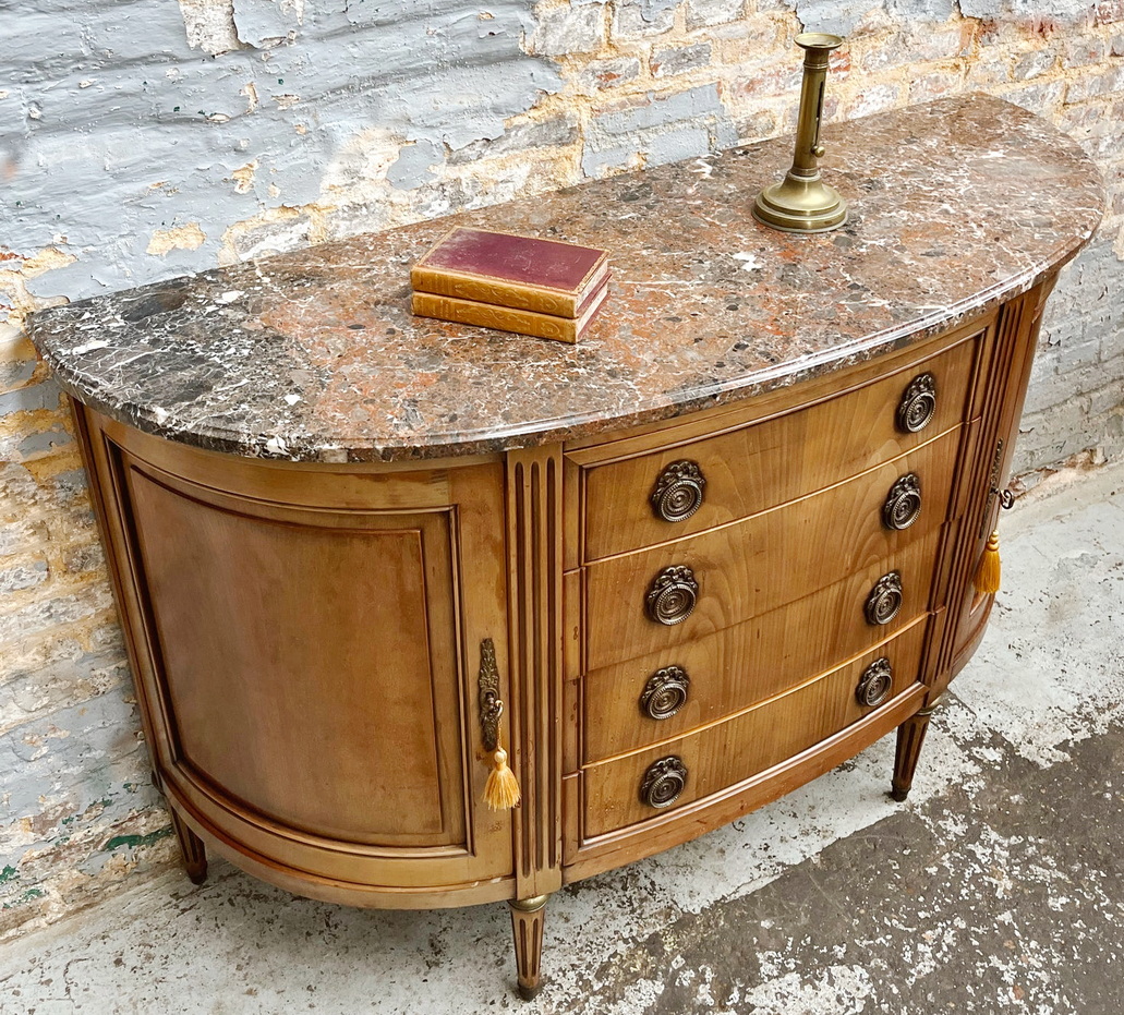 A French Louis XVI Demilune Commode